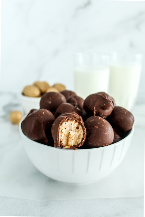 Old fashioned peanut butter balls thickly coated in butterscotch and chocolate.