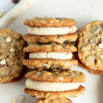 Three peanut butter cookie sandwiches filled with buttercream frosting.