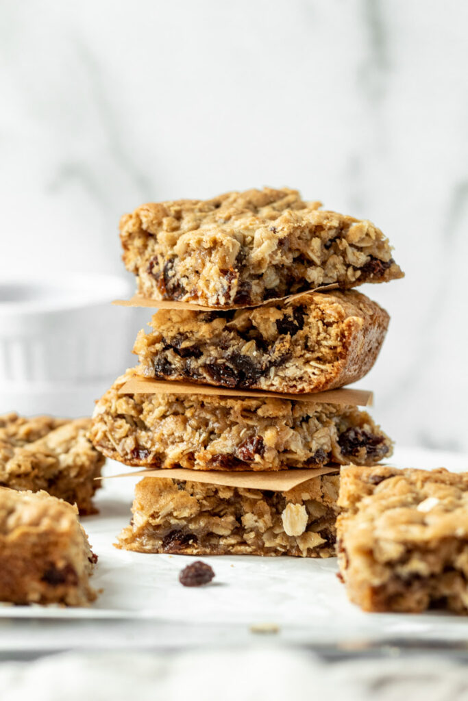 A stack of oatmeal raisin cookie bar squares. 