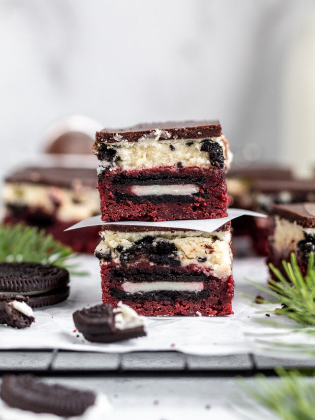 A stack of red velvet brownies with Oreos baked inside. 