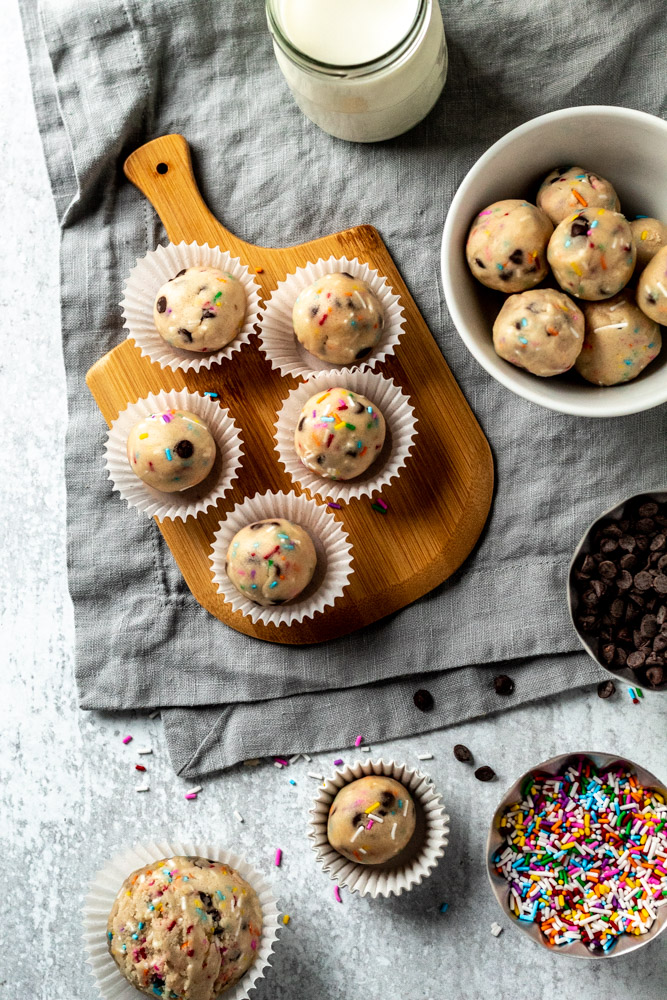 Edible cookie dough truffles packed with sprinkles and mini chocolate chips. 