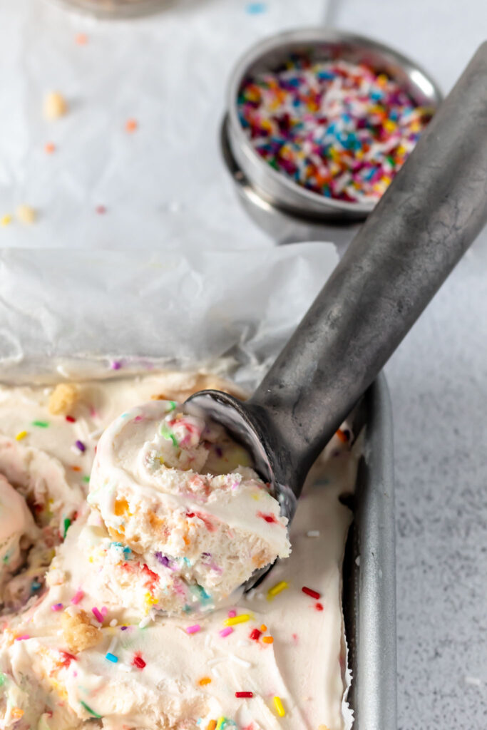 Sprinkle filled ice cream with crumbles in it in a parchment paper lined pan. 