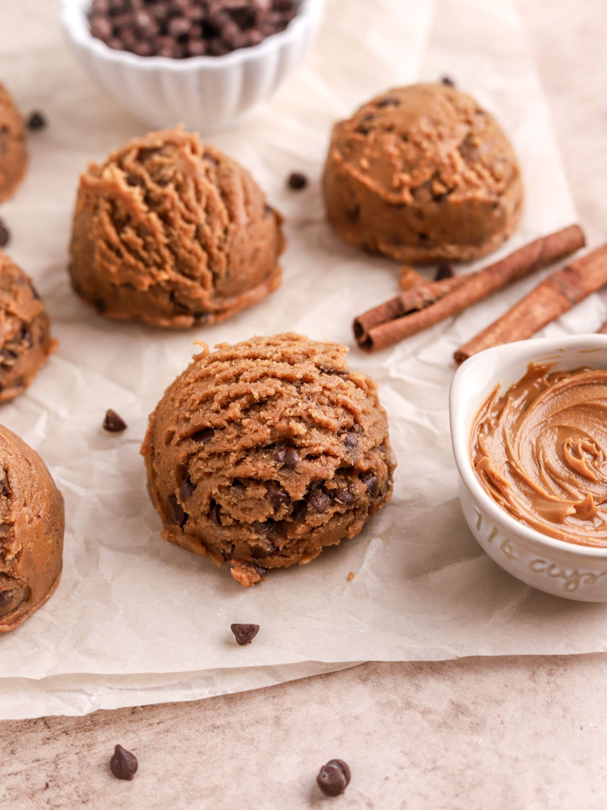 Biscoff cookie dough with mini chocolate chips and a cup of cookie butter.