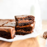 Brownies with layers of Nutella in the middle.