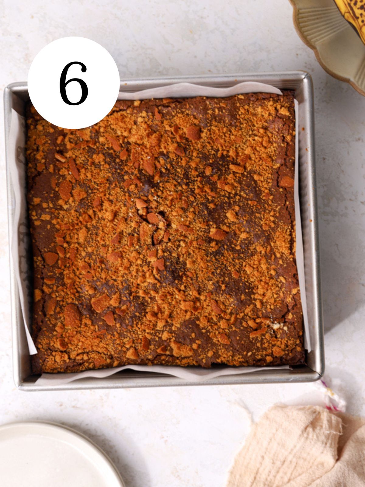 Freshly baked banana brownies in a square pan.