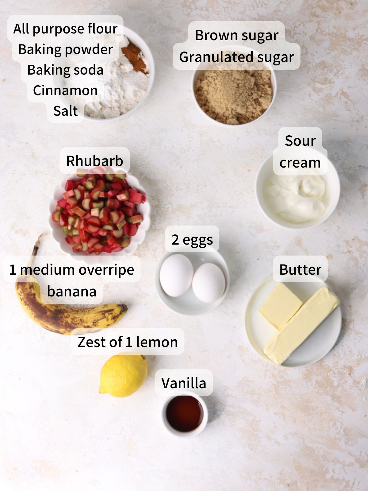 Labeled ingredients needed to make rhubarb muffins. 