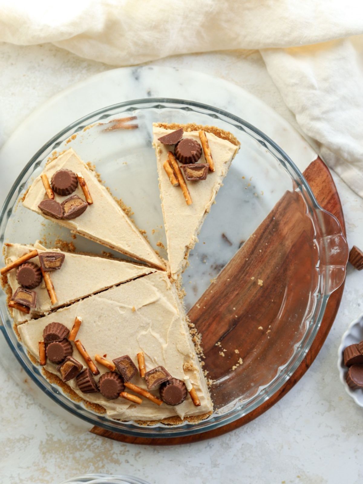 Peanut butter pie in a glass pie dish. 