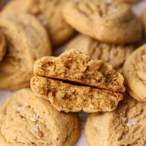 A batch of grapefruit cookies and one split in half.