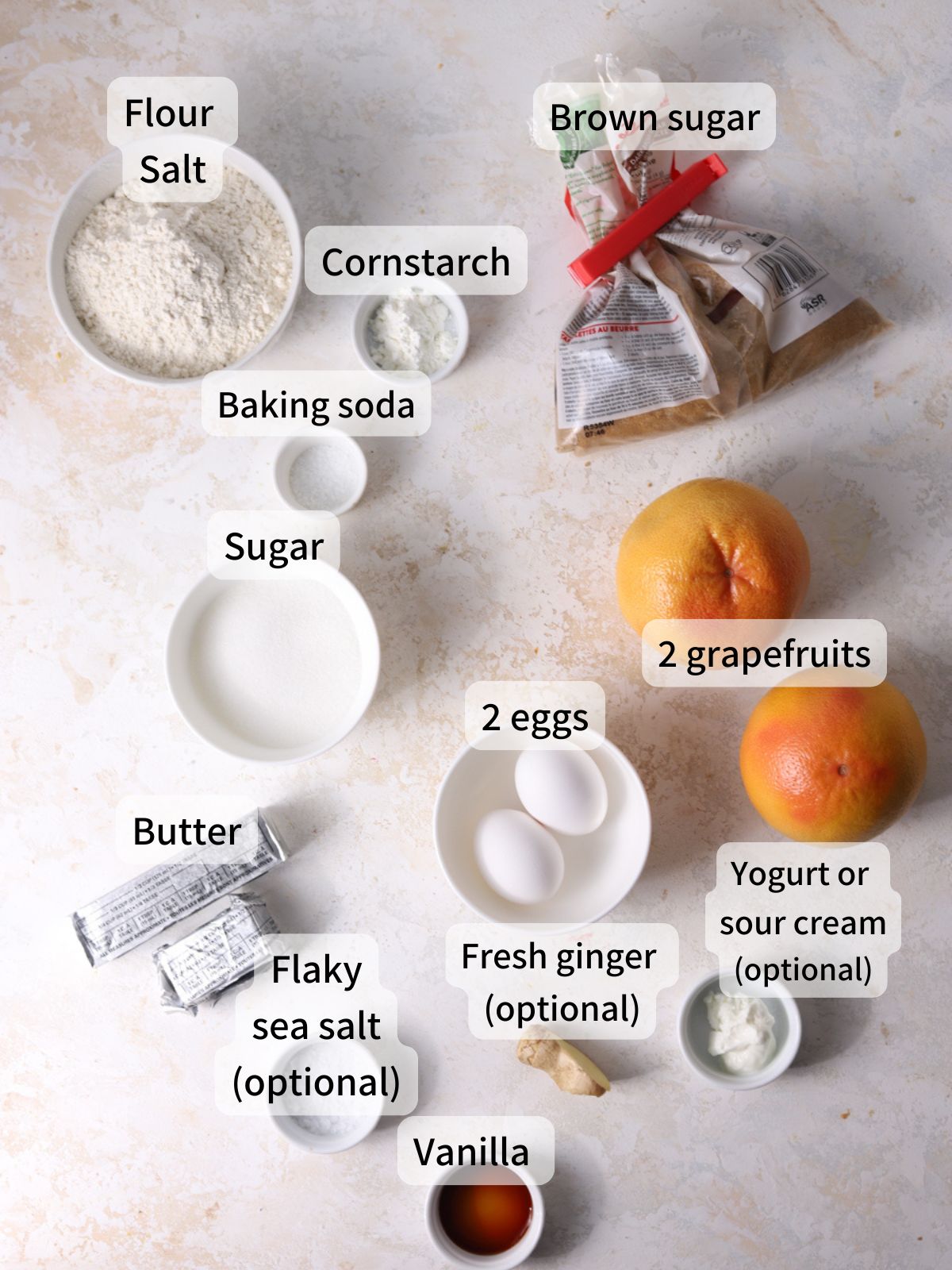 Labeled ingredients needed to make grapefruit cookies laid out on a table.