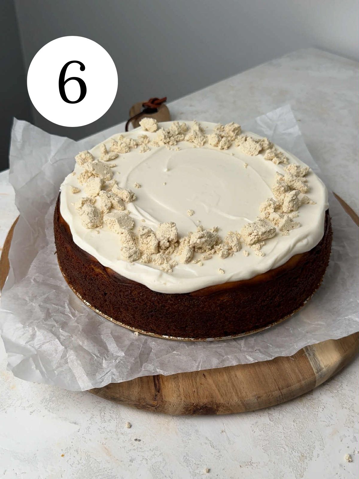 Cheesecake topped with labneh and decorated with halvan.