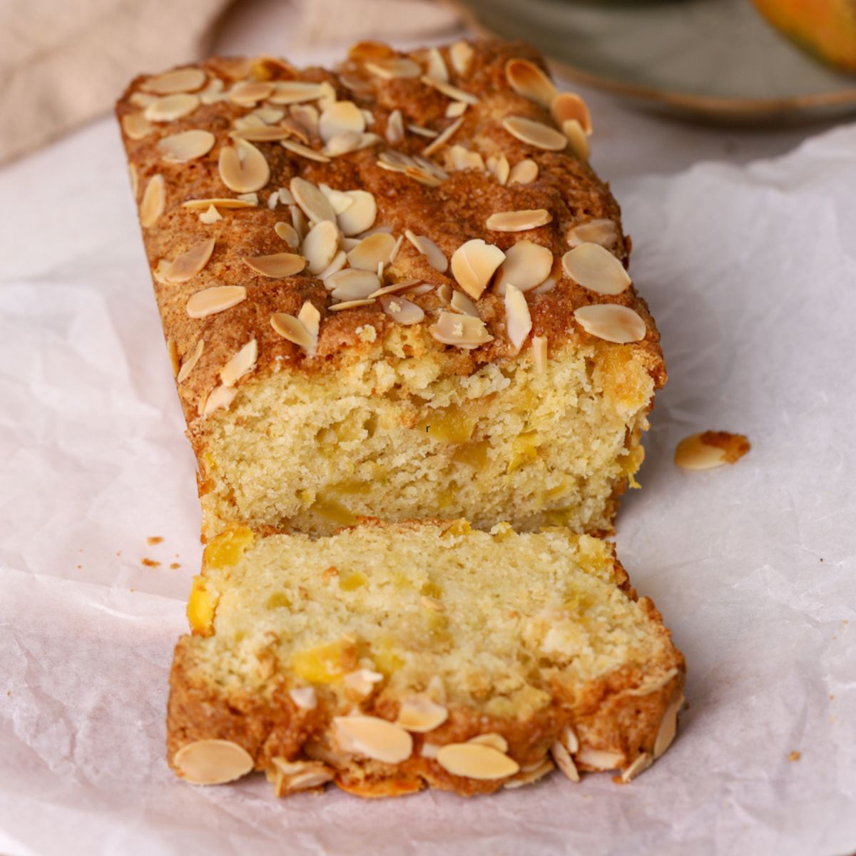 A loaf of mango bread sliced.